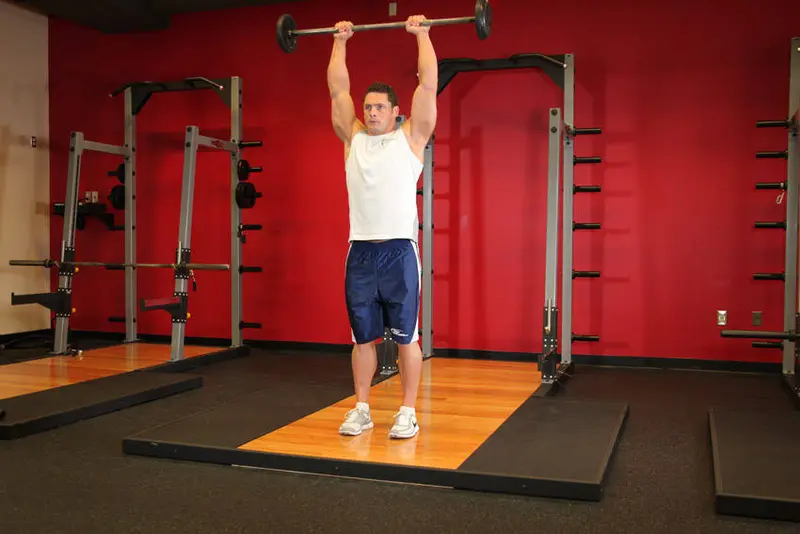 Standing Front Barbell Raise Over Head — finish position