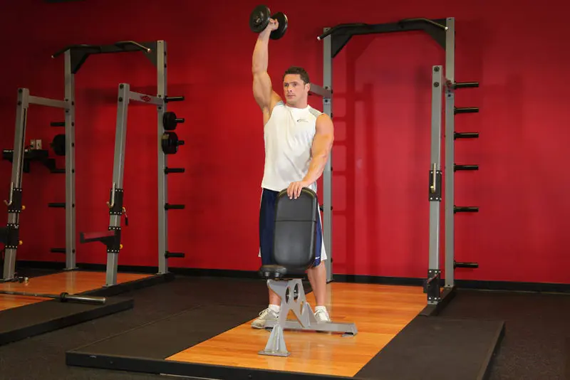 Standing Palm-In One-Arm Dumbbell Press — finish position