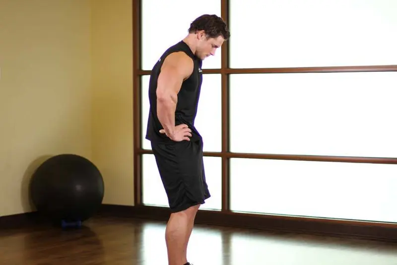 Standing Pelvic Tilt — finish position
