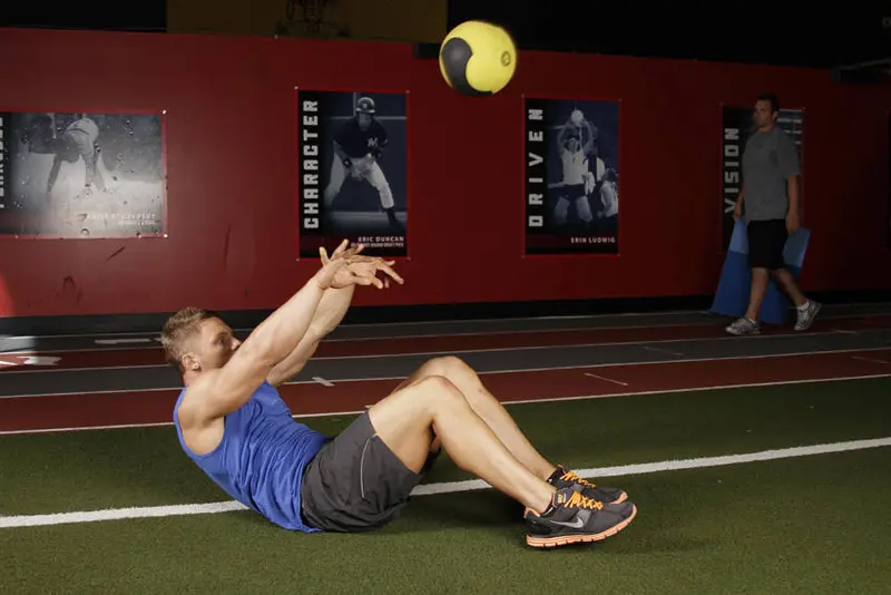 Supine Two-Arm Overhead Throw — finish position