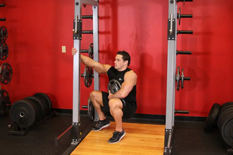 Weighted Sissy Squat — finish position
