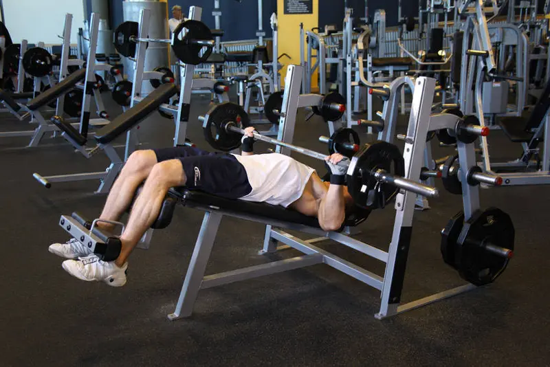 Wide-Grip Decline Barbell Bench Press — finish position