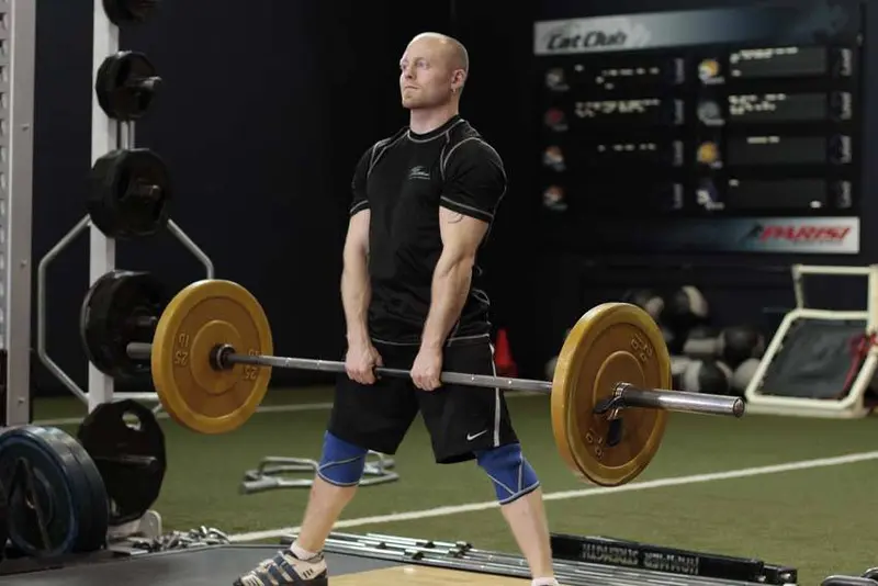 Wide Stance Stiff Legs — finish position